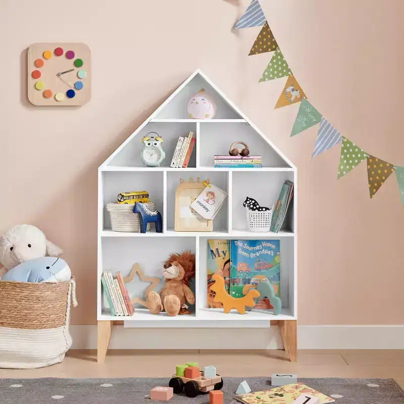 Bibliothèque autoportante blanche en forme de maison de poupée à 8 compartiments pour livres d'enfants ou figurines, avec pieds en hêtre