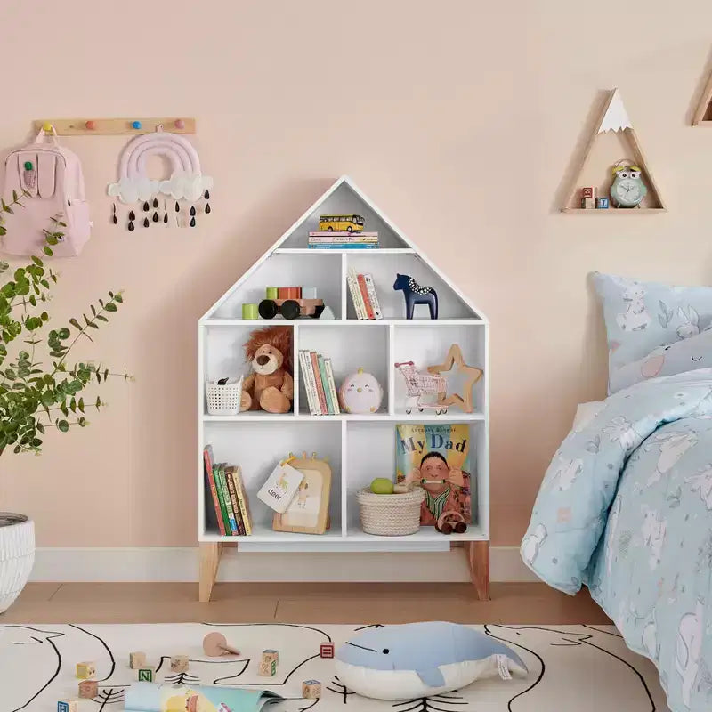 Bibliothèque autoportante blanche en forme de maison de poupée à 8 compartiments pour livres d'enfants ou figurines, avec pieds en hêtre