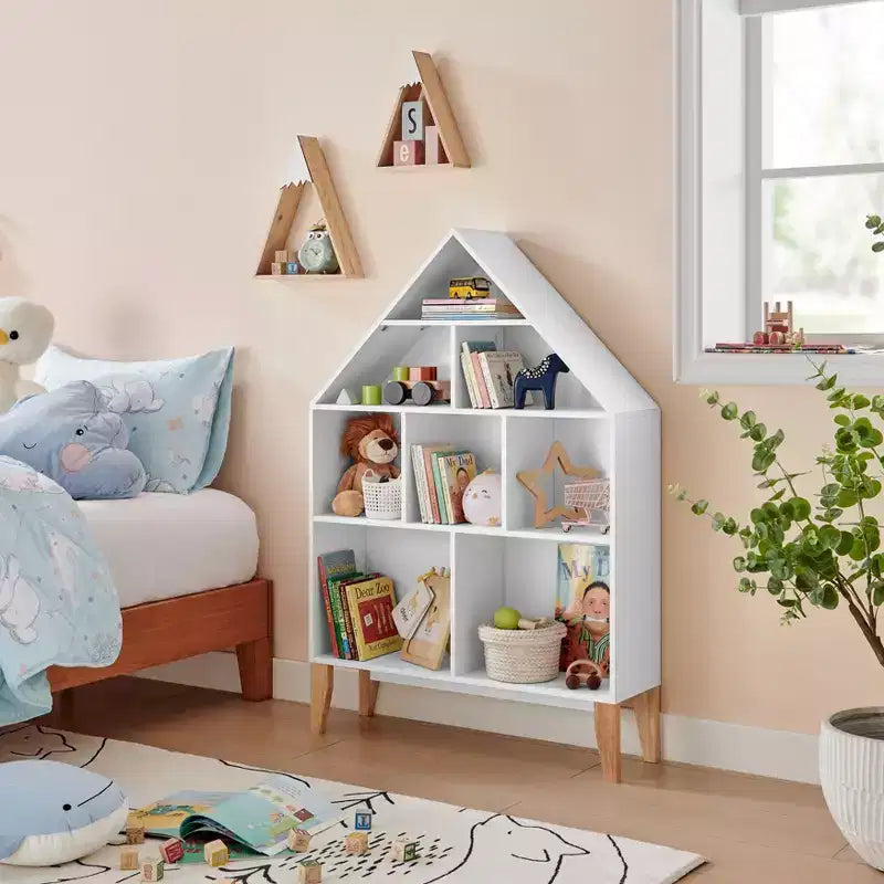 Bibliothèque autoportante blanche en forme de maison de poupée à 8 compartiments pour livres d'enfants ou figurines, avec pieds en hêtre